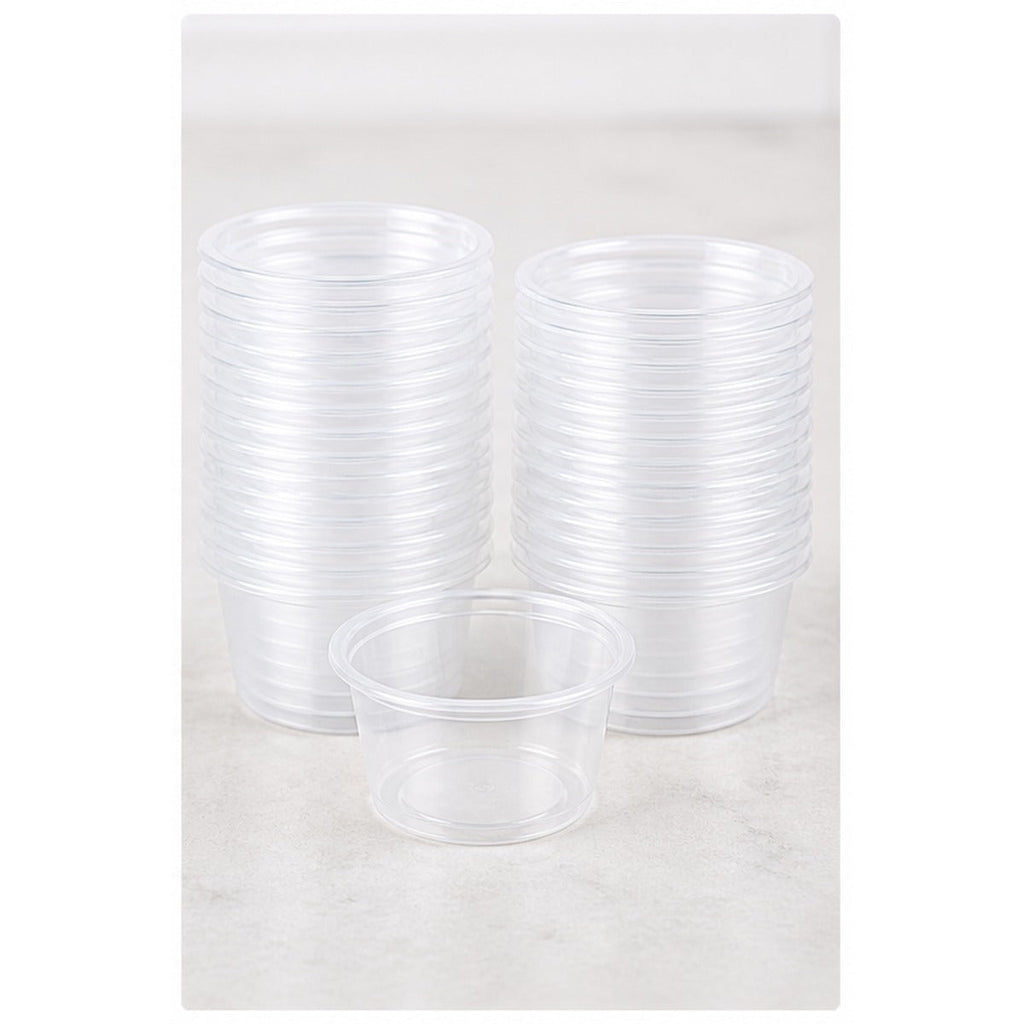 Stack of 0.75 oz clear plastic portion cups - 2,500/Case