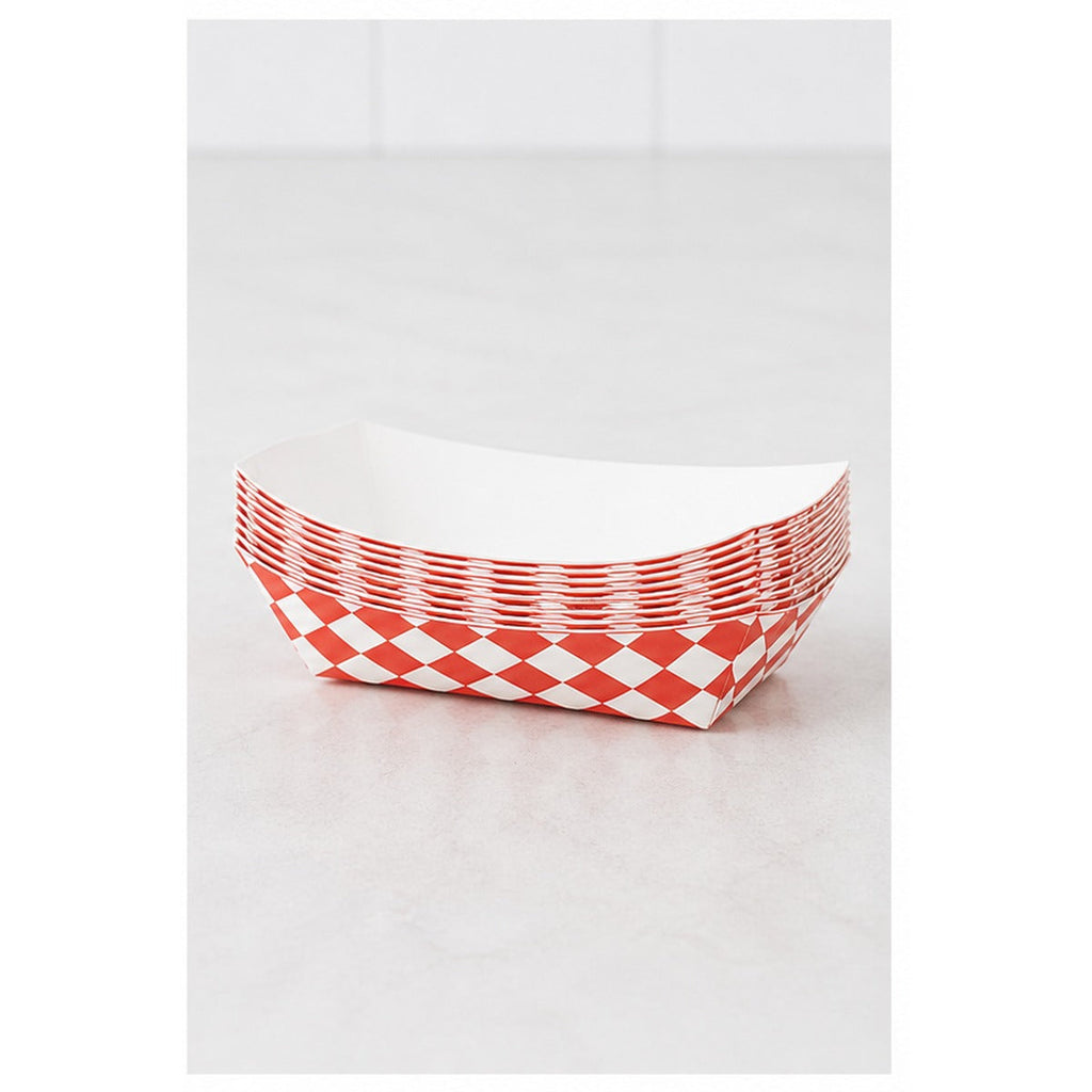 Stack of 1/2 lb red checkered paper food trays - 1,000/Case