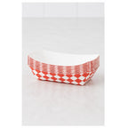 Stack of 1/2 lb red checkered paper food trays - 1,000/Case