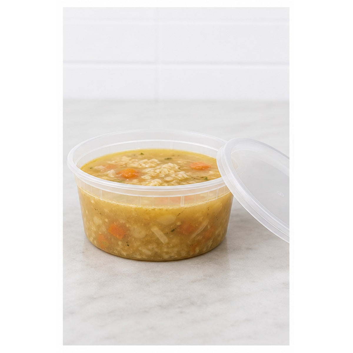 12 oz translucent deli soup container filled with soup