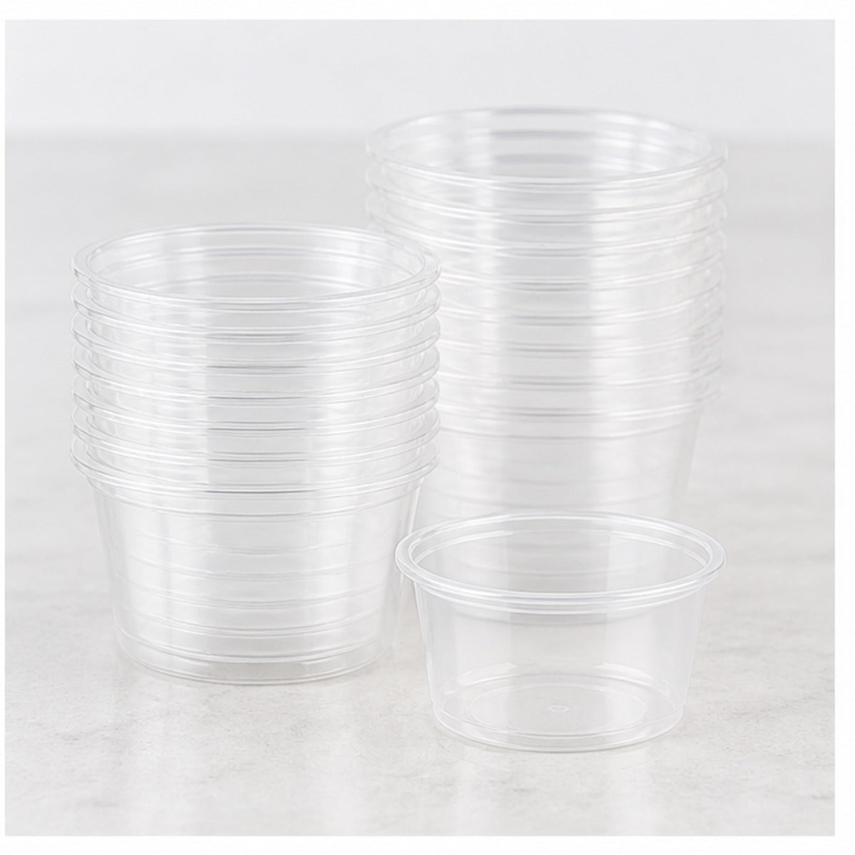 Stack of 1.5 oz clear plastic portion cups - 2,500/Case
