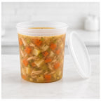 24 oz translucent deli soup container filled with soup