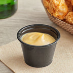 2oz. Black Plastic Souffle Cup / Portion Cup - 2,500/Case image 1 for NYC and Long Island restaurant supplies