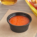 3.25oz. Black Plastic Souffle Cup / Portion Cup - 2,500/Case image 1 for NYC and Long Island restaurant supplies