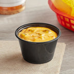 4oz. Black Plastic Souffle Cup / Portion Cup - 2,500/Case image 1 for NYC and Long Island restaurant supplies