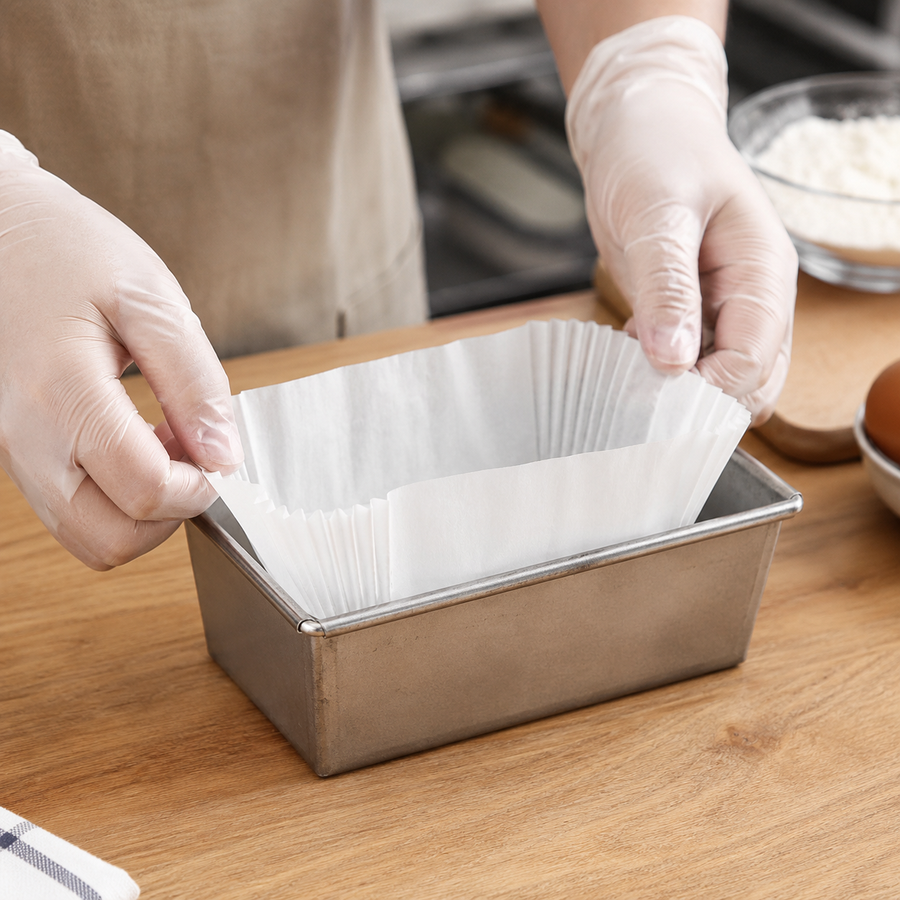 6 7/8" x 2 7/8" x 2 1/4" White Fluted Oblong Loaf Liners - 5,000/Case